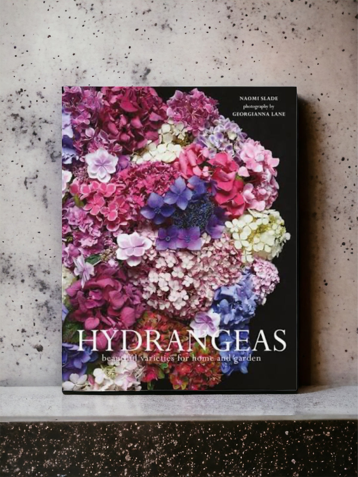 Hydrangeas book with a cover of pink, purple and blue hydrangea blooms