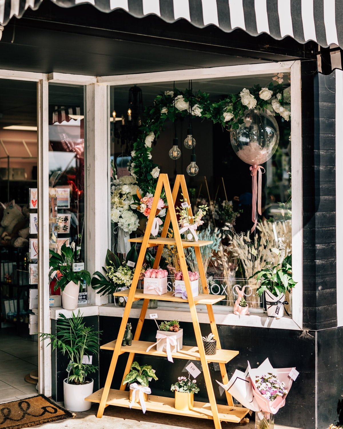 The Blossom Box Co. studio on Prospect Road, with flowers and gifts in the front window